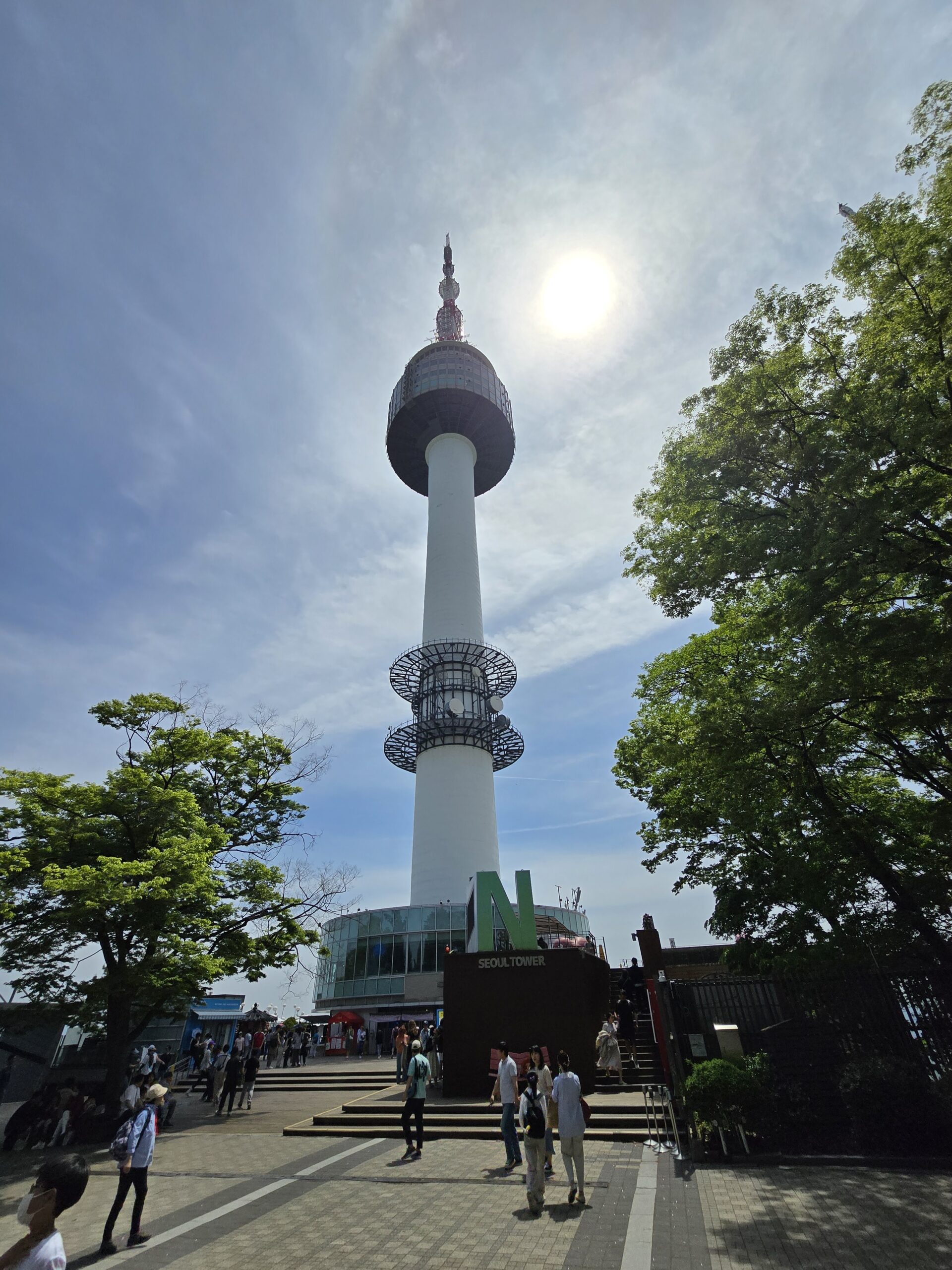 This is N Seoul Tower on Namsan Mountain in Seoul. It features an observation deck offering panoramic views of the city.